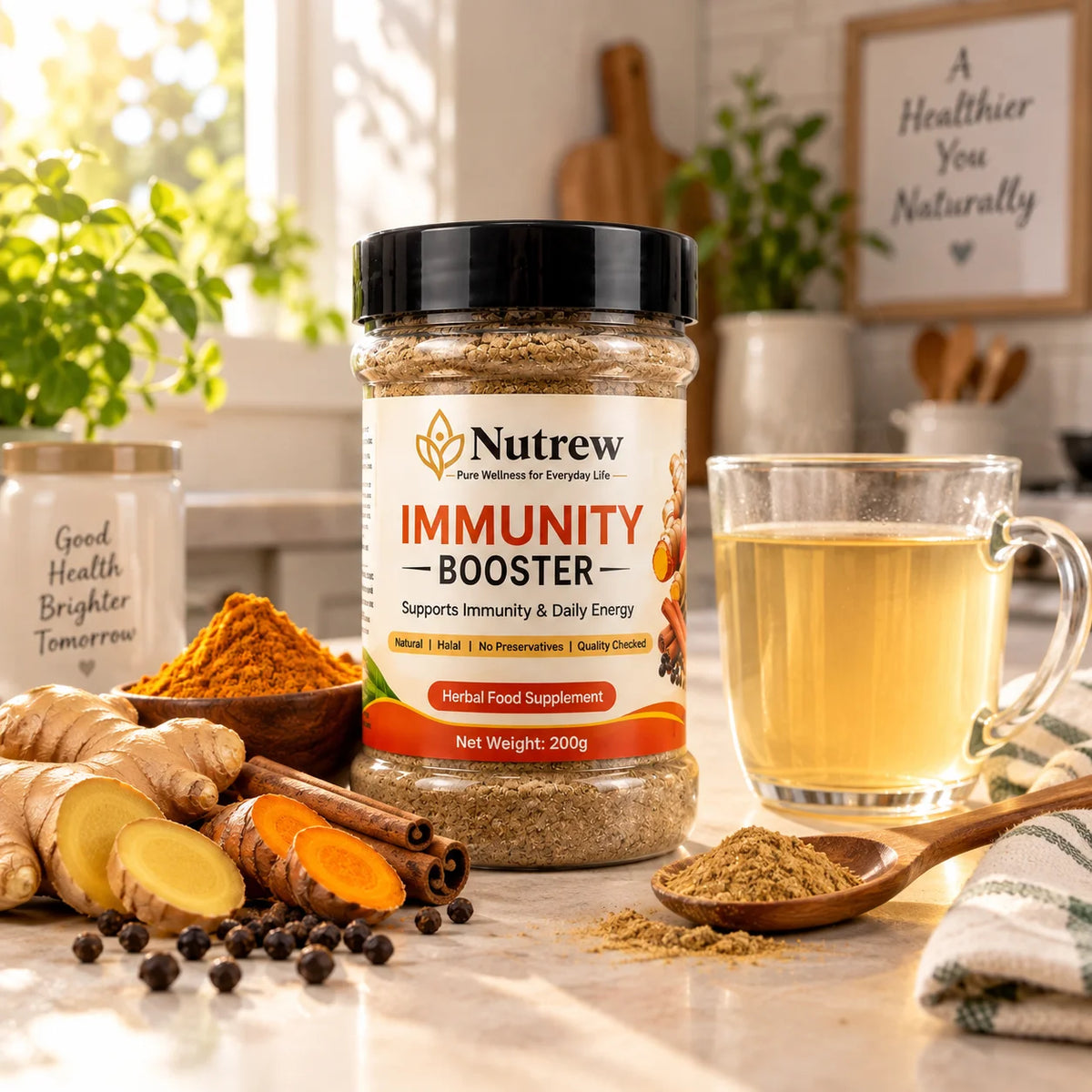 A jar of Nutrew Immunity Booster herbal food supplement stands on a kitchen counter surrounded by ginger roots, turmeric powder, cinnamon, black peppercorns, a glass mug of golden herbal tea, and a spoonful of the powder.