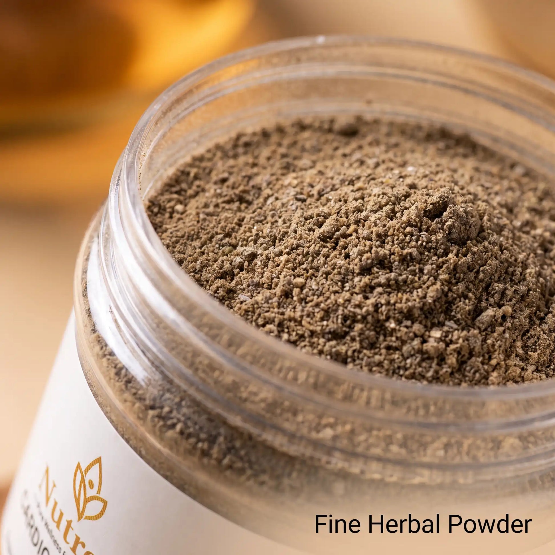 A close-up of a clear plastic jar filled with fine brown herbal powder, with a white label partially visible. The text 'Fine Herbal Powder' appears in the lower right corner.