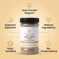 A bottle of Nutrew Cardio Support Blend herbal food supplement centered on a warm beige background, surrounded by gold icons and text highlighting benefits: heart health support, digestion support, natural ingredients, halal certification, and no preservatives.